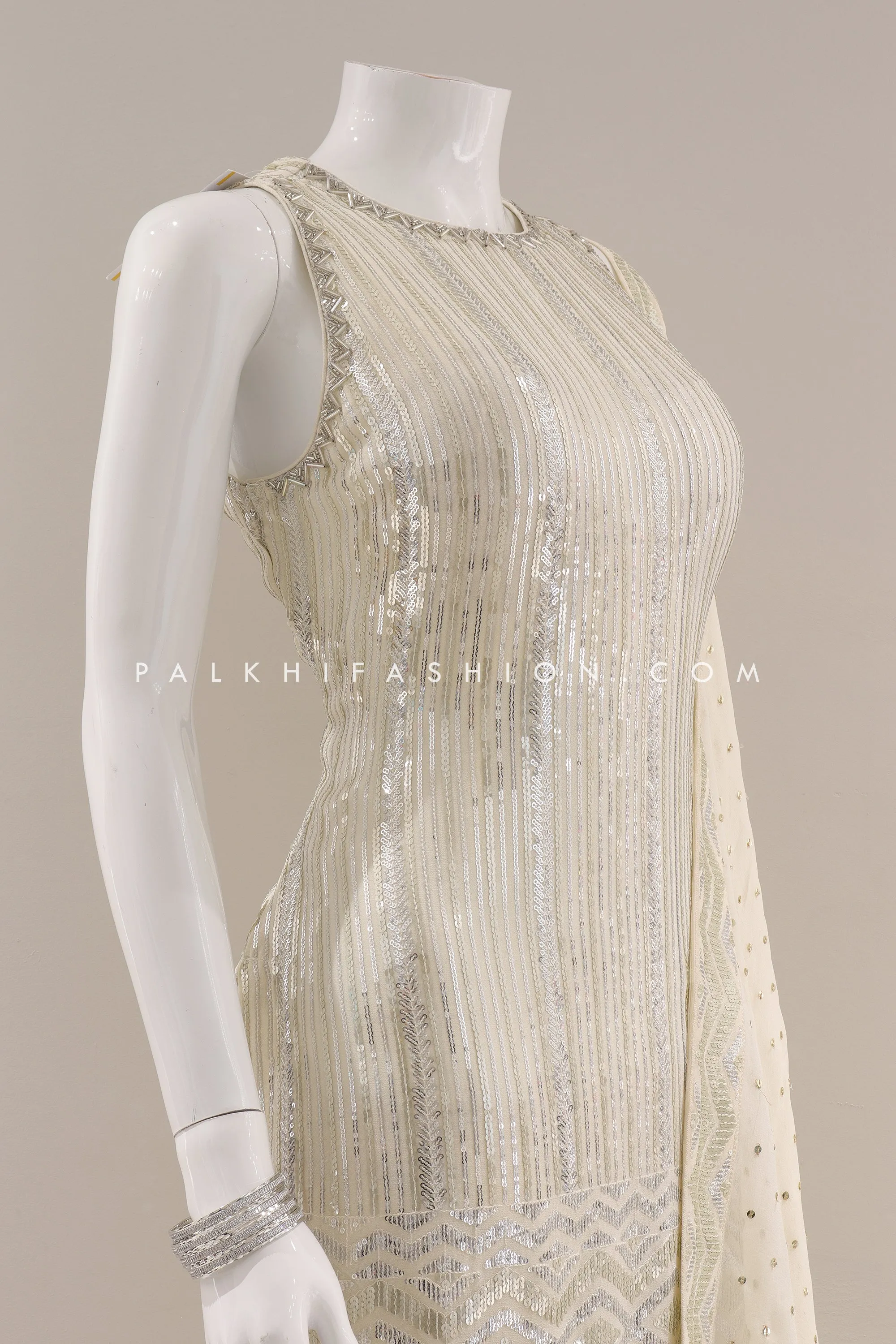 White Pearl: Embroidered Gharara Outfit with Attractive Pattern